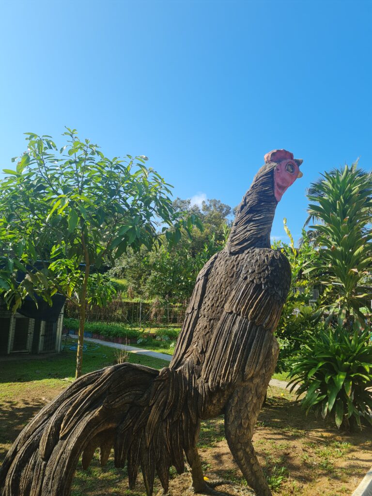Karak Orchard Resorts nature retreat Pahang rooster statue