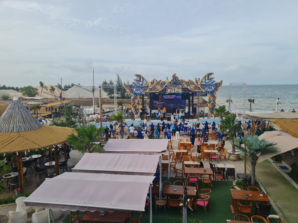 Crowd enjoying a live Zumba and dance event on the main stage at Bluefire Beach Club.